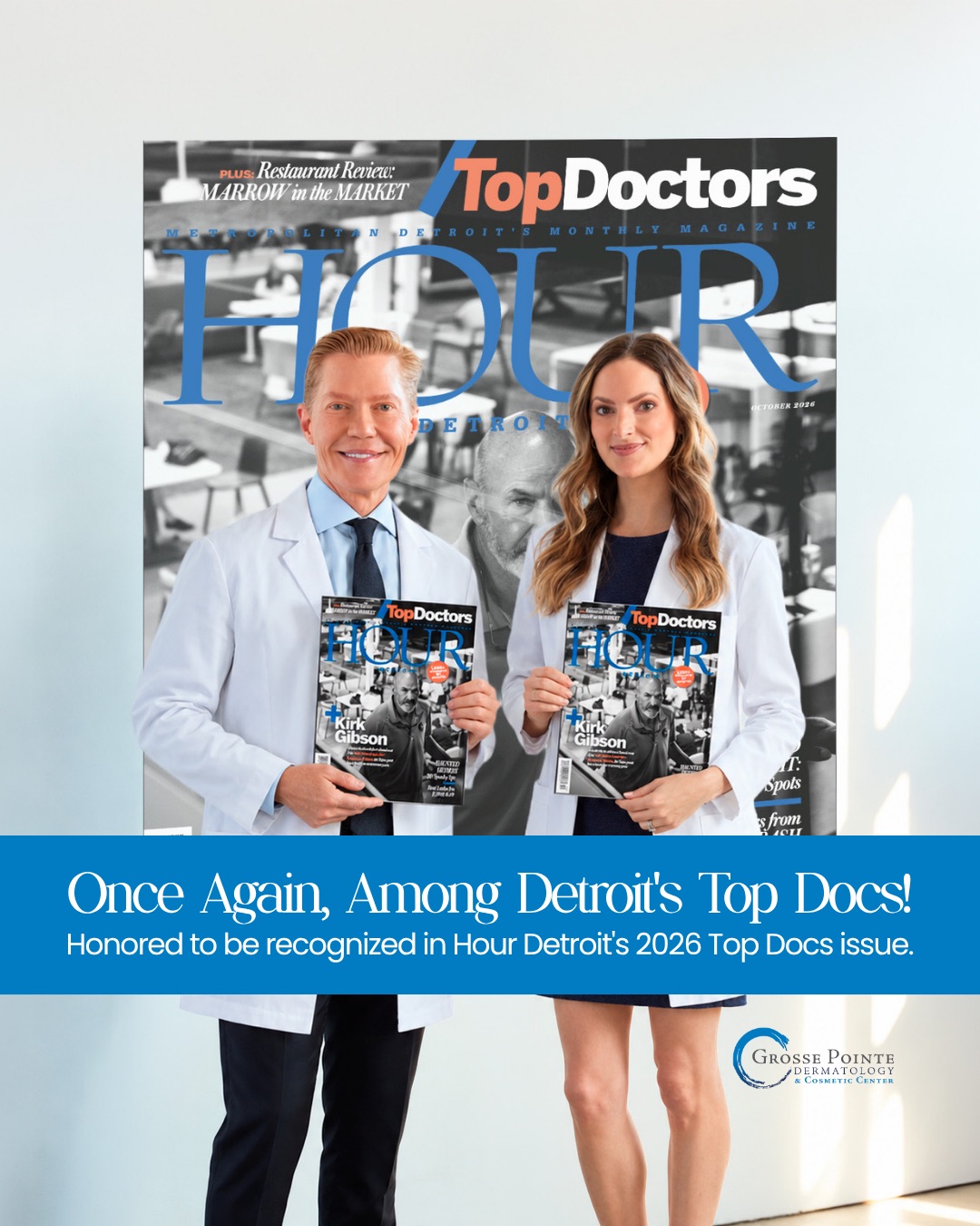 Dr. David Balle and colleague in white coats holding Hour Detroit Top Doctors magazines, honored in the 2026 Top Docs issue.